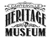 A black and white image of the carterville heritage museum.